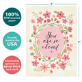 Load image into Gallery viewer, The cover of Tree-Free’s You Are Loved card with lines demonstrating its 5x7 dimensions, along with the following text: “100% PCW recycled paper, proudly made in the USA, sustainably printed on extra-thick card stock”
