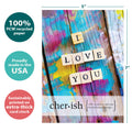 Load image into Gallery viewer, The cover of Tree-Free’s Vibrant Love You card with lines demonstrating its 5x7 dimensions, along with the following text: “100% PCW recycled paper, proudly made in the USA, sustainably printed on extra-thick card stock”
