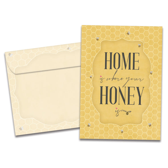 The cover of Tree-Free's Honey Home card, along with its matching envelope.