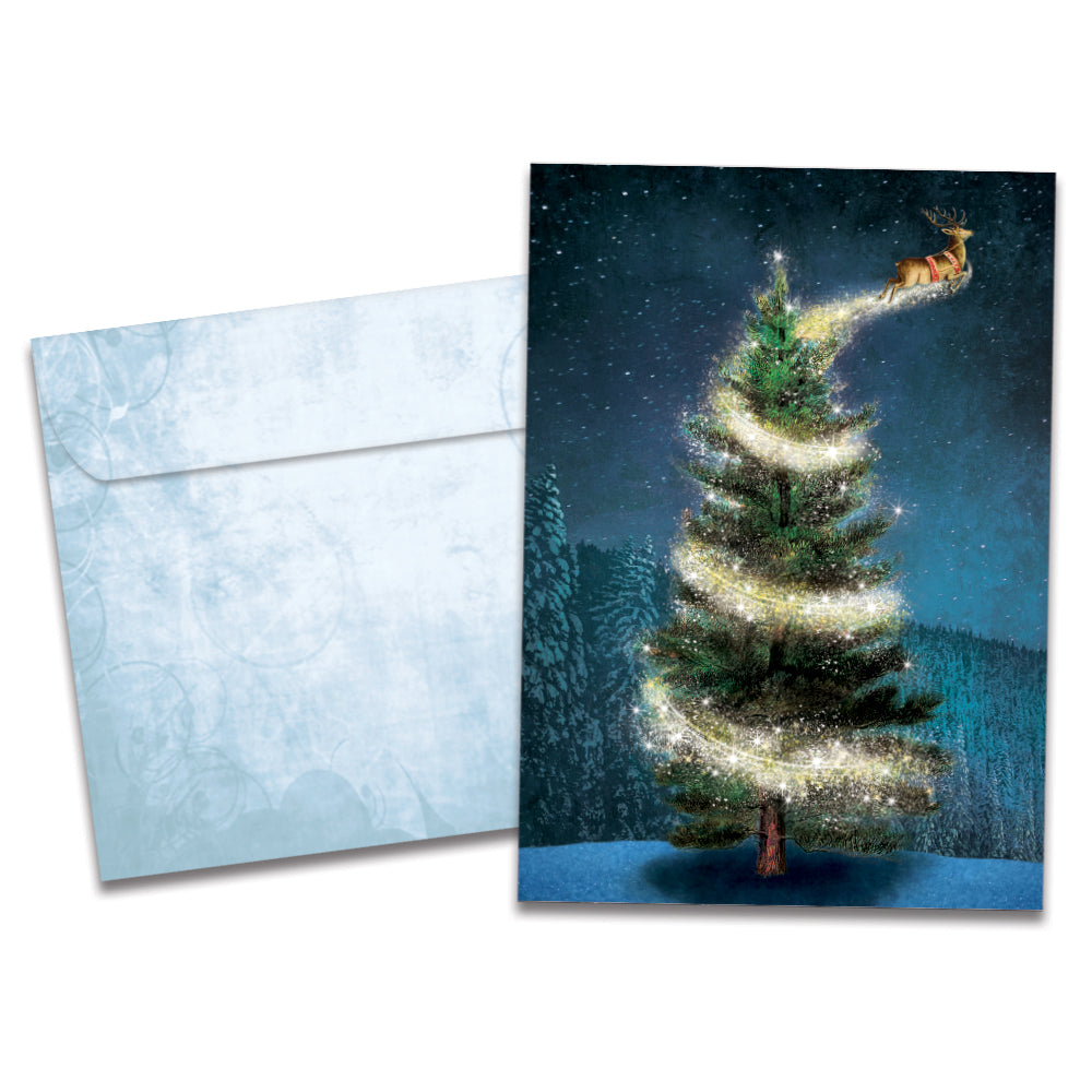 The cover of Tree-Free's Magical Reindeer card, along with its matching envelope.