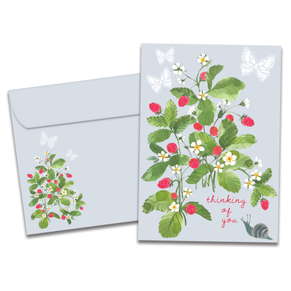 The cover of Tree-Free's Strawberry Plant Thinking Of You Card card, along with its matching envelope.