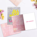 Load image into Gallery viewer, The inside of Tree-Free’s All You Need is Love card, with the cover and envelope in the background.
