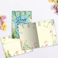 Load image into Gallery viewer, The inside of Tree-Free’s Dream Without Fear card, with the cover and envelope in the background.
