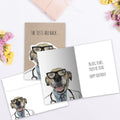 Load image into Gallery viewer, The inside of Tree-Free’s Dead In Dog Years card, with the cover and envelope in the background.
