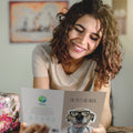 Load image into Gallery viewer, Lifestyle image(s) featuring Tree-Free’s Dead In Dog Years card

