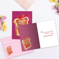 Load image into Gallery viewer, The inside of Tree-Free’s Peanut Butter and Jelly card, with the cover and envelope in the background.
