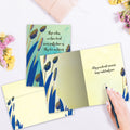 Load image into Gallery viewer, The inside of Tree-Free’s Loved Ones Never Leave Us card, with the cover and envelope in the background.
