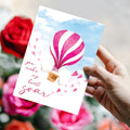 Load image into Gallery viewer, Lifestyle image(s) featuring Tree-Free’s Heart Soar card
