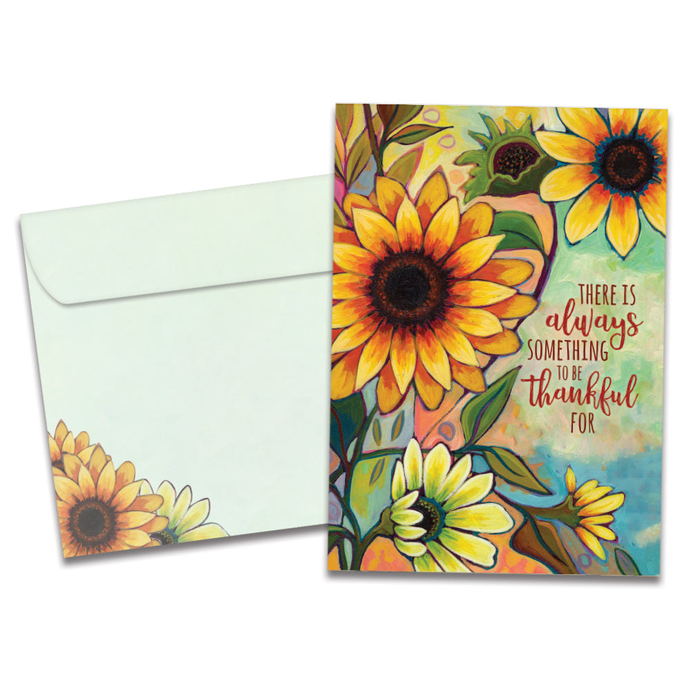 The cover of Tree-Free's Thankful Sunflowers Thanksgiving Card card, along with its matching envelope.