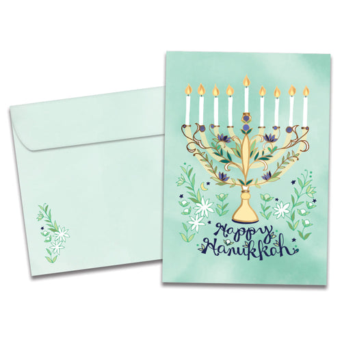 The cover of Tree-Free's Floral Menorah Hanukkah Card card, along with its matching envelope.