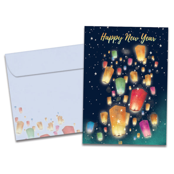 The cover of Tree-Free's Floating Lights New Year Card card, along with its matching envelope.