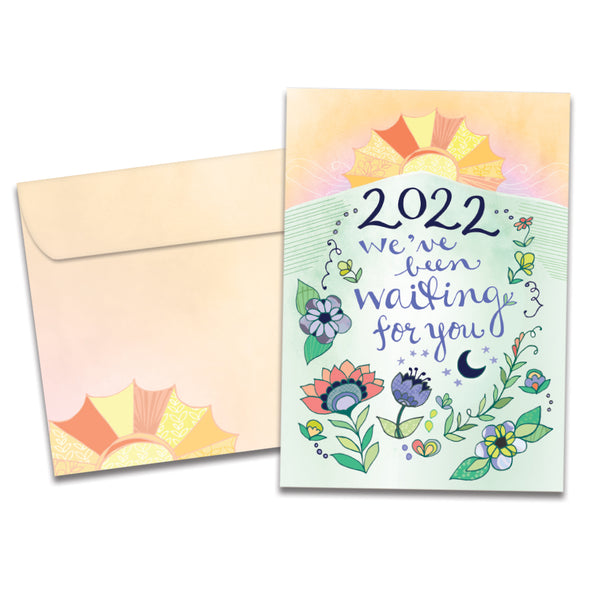 The cover of Tree-Free's Waiting For 2022 New Year Card card, along with its matching envelope.
