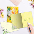 Load image into Gallery viewer, The inside of Tree-Free’s Gift of Warmth card, with the cover and envelope in the background.
