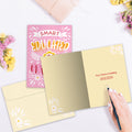 Load image into Gallery viewer, The inside of Tree-Free’s Educated and Graduated card, with the cover and envelope in the background.
