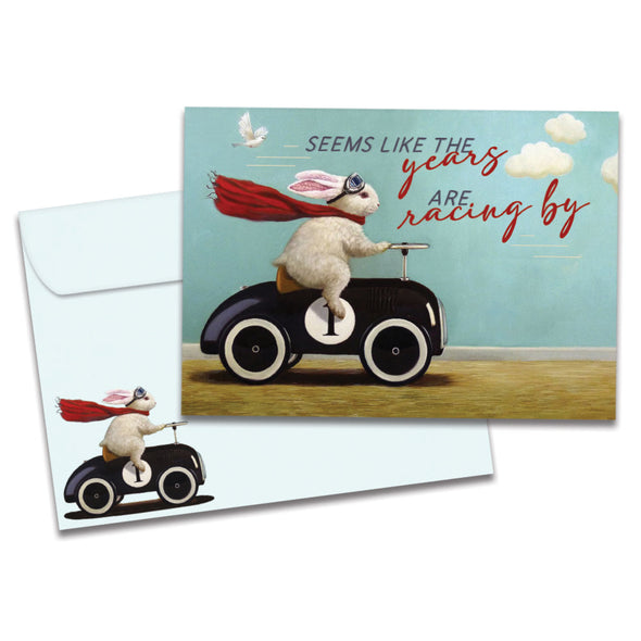 The cover of Tree-Free's Racing By card, along with its matching envelope.