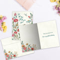 Load image into Gallery viewer, The inside of Tree-Free’s Joy You Give card, with the cover and envelope in the background.
