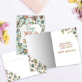Load image into Gallery viewer, The inside of Tree-Free’s Wild at Heart card, with the cover and envelope in the background.
