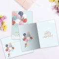 Load image into Gallery viewer, The inside of Tree-Free’s Carried Away card, with the cover and envelope in the background.
