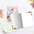 Load image into Gallery viewer, The inside of Tree-Free’s Best Day Ever card, with the cover and envelope in the background.
