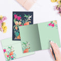 Load image into Gallery viewer, The inside of Tree-Free’s Lion Floral Bouquet card, with the cover and envelope in the background.
