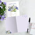 Load image into Gallery viewer, The inside of Tree-Free’s Bunny Bouquet card, with the cover and envelope in the background.
