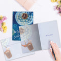 Load image into Gallery viewer, The inside of Tree-Free’s Believe Mouse card, with the cover and envelope in the background.
