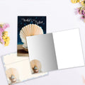 Load image into Gallery viewer, The inside of Tree-Free’s The World Is Your Oyster card, with the cover and envelope in the background.
