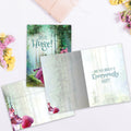 Load image into Gallery viewer, The inside of Tree-Free’s Huge Acorn card, with the cover and envelope in the background.
