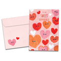 Load image into Gallery viewer, The cover of Tree-Free&#39;s Happy Hearts card, along with its matching envelope.
