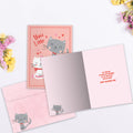 Load image into Gallery viewer, The inside of Tree-Free’s You and Me Forever card, with the cover and envelope in the background.
