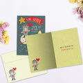 Load image into Gallery viewer, The inside of Tree-Free’s Beary Much World card, with the cover and envelope in the background.
