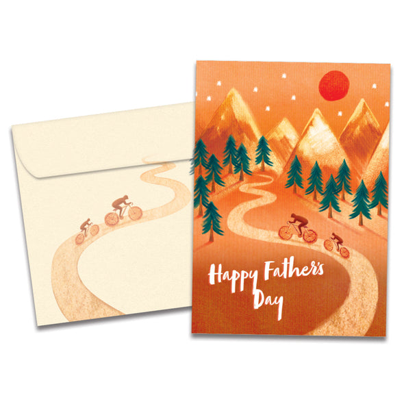 The cover of Tree-Free's Bike Adventure card, along with its matching envelope.