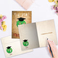 Load image into Gallery viewer, The inside of Tree-Free’s Yippea card, with the cover and envelope in the background.
