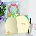 Load image into Gallery viewer, The inside of Tree-Free’s Rainbow Bunnies card, with the cover and envelope in the background.
