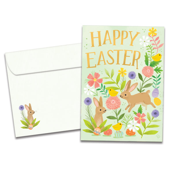 The cover of Tree-Free's Floral Bunnies card, along with its matching envelope.