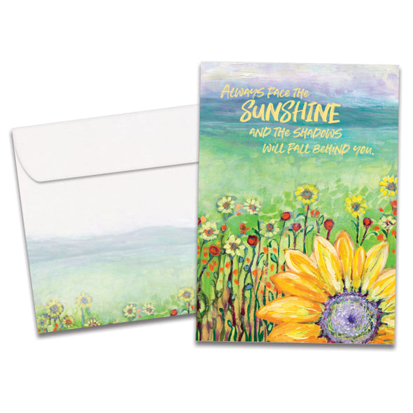 The cover of Tree-Free's Delight Sunflower card, along with its matching envelope.