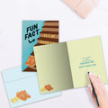 Load image into Gallery viewer, The inside of Tree-Free’s Stepdads Fun Fact card, with the cover and envelope in the background.
