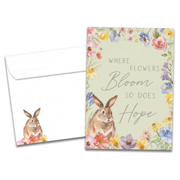 The cover of Tree-Free's Hope Blooms card, along with its matching envelope.