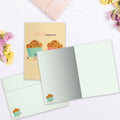 Load image into Gallery viewer, The inside of Tree-Free’s Muffin Compares To You card, with the cover and envelope in the background.
