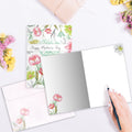 Load image into Gallery viewer, The inside of Tree-Free’s Floral Inspiration card, with the cover and envelope in the background.
