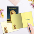 Load image into Gallery viewer, The inside of Tree-Free’s Lotus Yoga Chick card, with the cover and envelope in the background.
