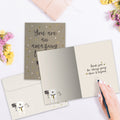 Load image into Gallery viewer, The inside of Tree-Free’s An Amazing Teacher card, with the cover and envelope in the background.

