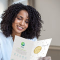 Load image into Gallery viewer, Lifestyle image(s) featuring Tree-Free’s A Great Welcome card
