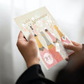 Load image into Gallery viewer, Lifestyle image(s) featuring Tree-Free’s Aniversario Champagne card
