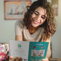 Load image into Gallery viewer, Lifestyle image(s) featuring Tree-Free’s Adventures Begin card
