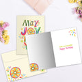 Load image into Gallery viewer, The inside of Tree-Free’s May Joy Find You card, with the cover and envelope in the background.

