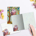 Load image into Gallery viewer, The inside of Tree-Free’s Owl Matters card, with the cover and envelope in the background.
