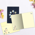 Load image into Gallery viewer, The inside of Tree-Free’s Relax Connect Harness card, with the cover and envelope in the background.

