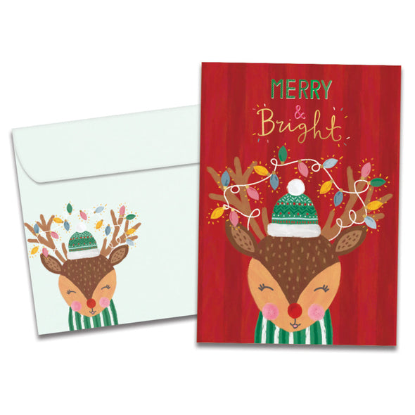 The cover of Tree-Free's Merry Bright Reindeer card, along with its matching envelope.