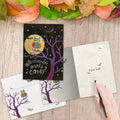 Load image into Gallery viewer, The inside of Tree-Free’s Who Wants Candy card, with the cover and envelope in the background.
